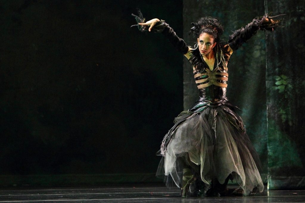 This shot of the Dayton Ballet’s Dracula: Bloodlines illustrates toning. Emerald Green lighting pulls out the greens in the scenery and costumes. You can notice the green light on the dancer, but the unsaturated key lighting of the scene keeps her from appearing overly green.
Lighting Design by the Joe Beumer. Photo by Geek with a Lens Photography.